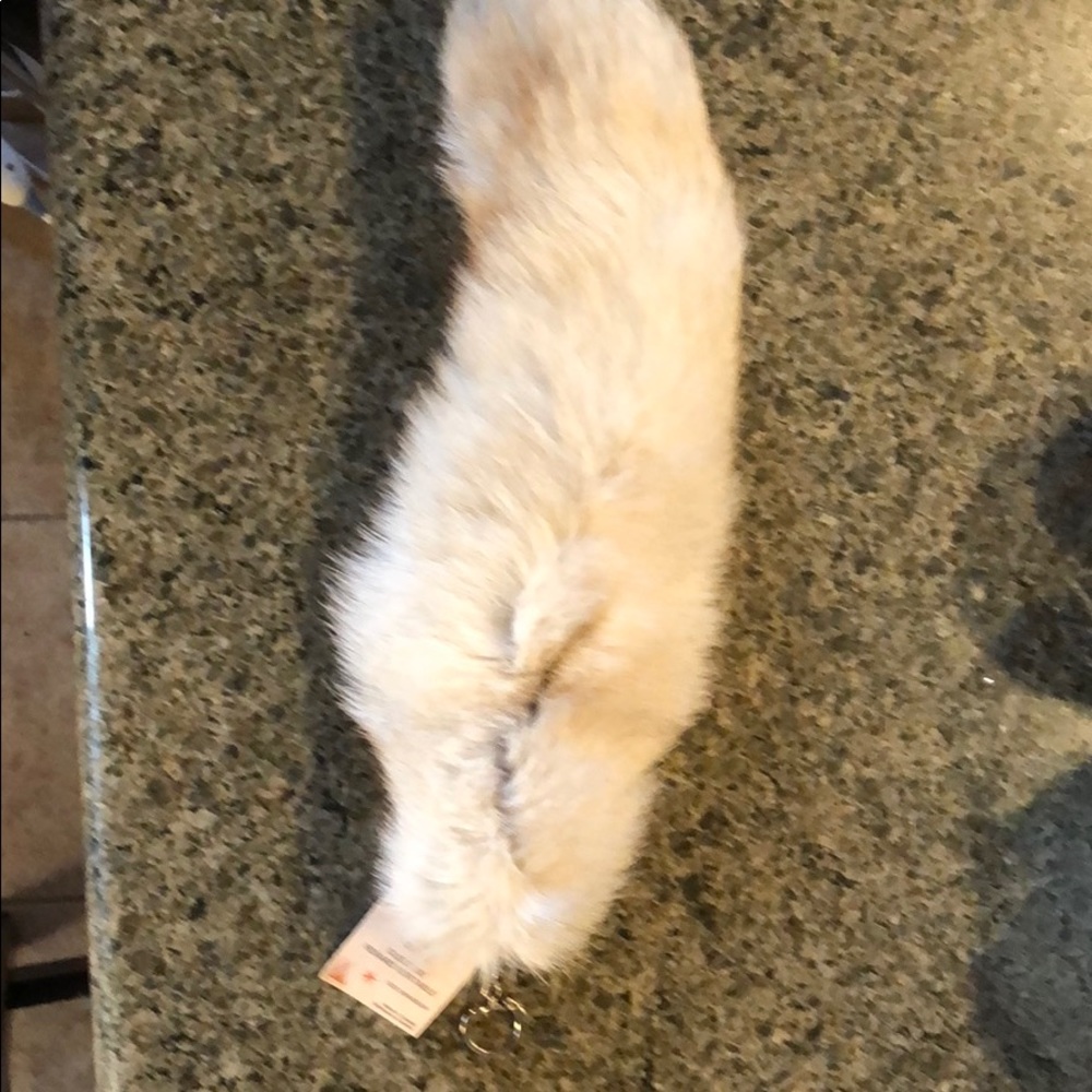 White fox tail with key ring. New with tags.